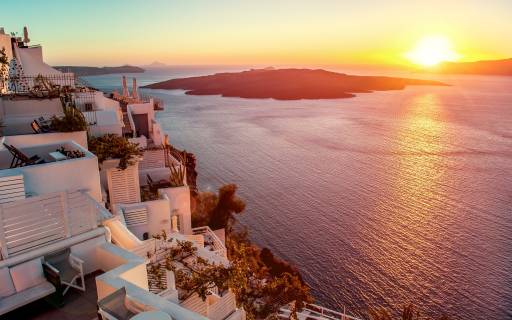 enjoy the stunning sunset in Santorini